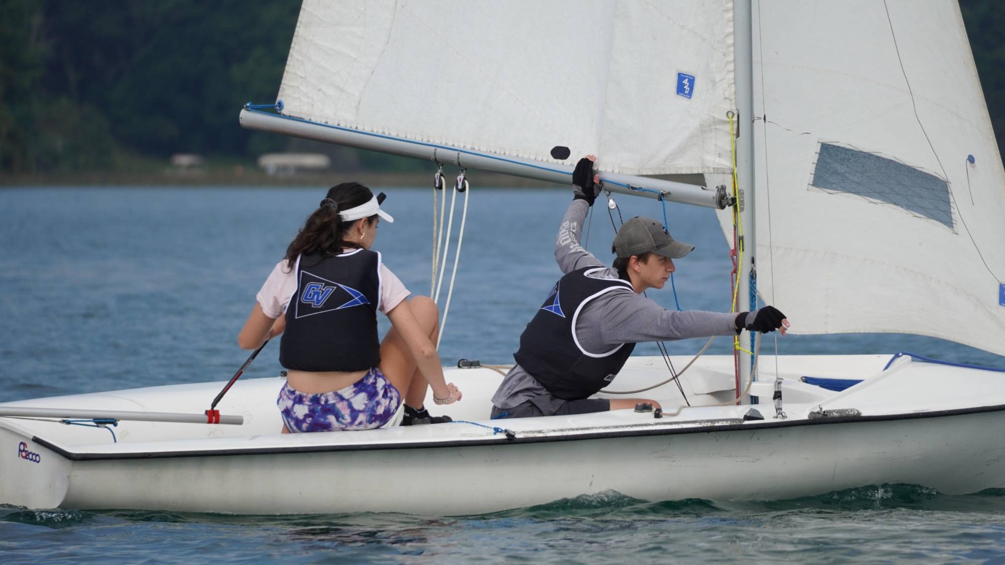 Two GVSU sailors in a boat